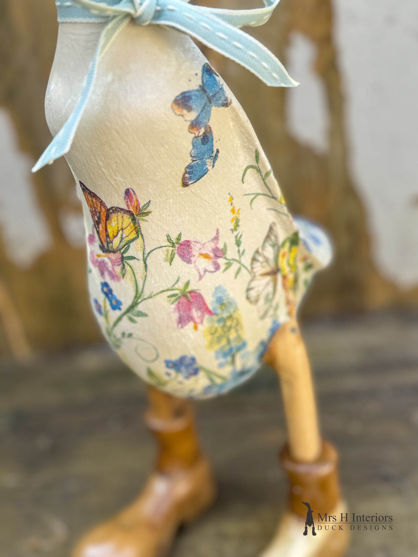 Bella the butterfly & summer flowers decorated Wooden Duck in Boots by Mrs H the Duck Lady